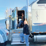 Mark Buckwalter (in the cab) is technically a company driver for his son, Lamar Buckwalter. However, Lamar said “whatever he wants he gets.” (Photo by Lane Buckwalter)