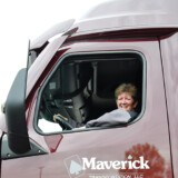 Liz Imel has driven for Maverick Transportation since 2012. She started out hauling refrigerated trailers; but when the company sold its refrigerated division, she moved over to hauling boats on flatbed trailers. (Hannah Butler/The Trucker)