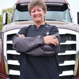 Liz Imel has driven for Maverick Transportation since 2012. She started out hauling refrigerated trailers; but when the company sold its refrigerated division, she moved over to hauling boats on flatbed trailers. (Hannah Butler/The Trucker)