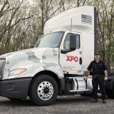 XPO Logistics’ camo-wrapped tractors honor the nation’s military not just during Military Appreciation Month, but all year long. (Courtesy: XPO Logistics)