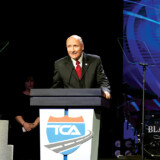 Truckload Carriers Association Chairman and D.M. Bowman, Inc., President Jim Ward addresses association members during the closing banquet of Truckload 2021: Las Vegas. The three-day convention wrapped up with a performance by country music legend Clint Black.