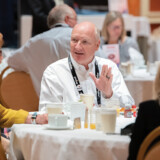 TCA Chairman Jim Ward visits with association members during Truckload 2021: Las Vegas.