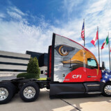 An eagle-wrapped True to the Troops truck is displayed in front of CFI’s Joplin, Missouri, headquarters. Those Who Deliver 3