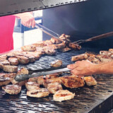 Each year, the Iowa 80's Pork Chop Cookout serves up more than 5,500 pork chops, nearly 6,000 chicken breasts and 1,000 hot dogs. (Linda Garner-Bunch/The Trucker)