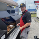 Each year, the Iowa 80's Pork Chop Cookout serves up more than 5,500 pork chops, nearly 6,000 chicken breasts and 1,000 hot dogs. (Linda Garner-Bunch/The Trucker)