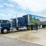 Hand-painted murals wrap this refrigerated trailer. The rig is owned by Marcel Pontbriand, whose Cowboy of the Road won People's Choice and Best Theme. (Linda Garner-Bunch/The Trucker)