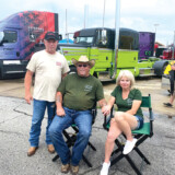 Brett "Rusty" Chastain visits with Daniel and Phyllis Snow during the Jamboree. (Linda Garner-Bunch/The Trucker)