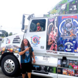 Rodney Crouch, who owns and operates Indiana-based Dangerfield Trucking, enjoys life on the road with Sammi, a rescue dog found wandering at a truck stop by a friend. (Courtesy: Rodney Crouch) 0926 Rodney Crouch 1