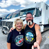 For Illinois-based team drivers Larry and Angie Baum, life on the road is three times better with their canine companions, Gizmo, Bandit and Nova. The couple, who drive for Landstar, say they now live on the road full-time. (Courtesy: Larry and Angie Baum)