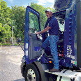 When Richard Jones, a driver for NFI Industries, earned his CDL, he initially planned for trucking to be a “fallback” plan for his career — but then he was bitten by the trucking bug. (Bobby Ralston/The Trucker)
