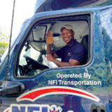 When Richard Jones, a driver for NFI Industries, earned his CDL, he initially planned for trucking to be a “fallback” plan for his career — but then he was bitten by the trucking bug. (Bobby Ralston/The Trucker)