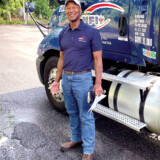 When Richard Jones, a driver for NFI Industries, earned his CDL, he initially planned for trucking to be a “fallback” plan for his career — but then he was bitten by the trucking bug. (Bobby Ralston/The Trucker)