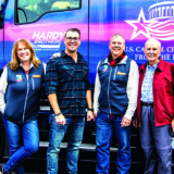 Members of the Kingdon family gather at one of the tour stops. Shown, from left, are Deb Kingdon; Joel Kingdon, son of Ed and Deb Kingdon; Ed Kingdon Jr.; and Harold Kingdon, Ed Kingdon’s father. (Photo by James Edward Mills)