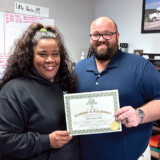 Recent CDL grad Sue Peña is shown here with Jed Shepherd, the director of Diesel Driving Academy's Little Rock, Arkansas, campus. Photo by Linda Garner-Bunch/The Trucker