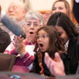 Ashley Leiva and her family react to the announcement of the winner of the Hiring Our Heroes Transition Trucking truck competition. (Courtesy: Ashley Leiva)