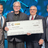 Maverick Transportation driver Thomas Sholar, second from left, receives his award check of $20,000. (Courtesy: TCA) 23 03 07 Sholar TCA web