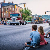 Kids are wowed by this 1972 Kenworth K125, followed by a 1973 W900A, at the second annual Kenworth Chillicothe, Ohio, Plant's Kenworth Truck Parade held on June 18, 2023. (Courtesy: Kenworth) Kenworth Parade
