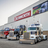 Big rigs are lined up at the Chillicothe, Ohio, Kenworth plant just before the second annual Kenworth Chillicothe Plant's Kenworth Truck Parade on June 18, 2023. (Courtesy: Kenworth) Kenworth Parade