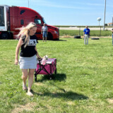 Eva Knelsen and Dixie share the limelight during the 2023 Trucker's Best Friend competition at the Walcott Truckers Jamboree. (Linda Garner-Bunch/The Trucker)