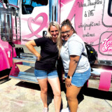 The Trucker staff writer Erica N. Guy and driver Eva Knelsen take time out for a little fun during the 2023 Walcott Truckers Jamboree, held at the Iowa 80 Truckstop July 13-15. (Linda Garner-Bunch/The Trucker)
