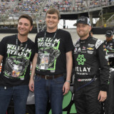 Relay Payments co-founders Spencer Barkoff (left) and Ryan Droege (center) pose with NASCAR driver William Byron before the race. (Courtesy: Nigel Kinrade Photography)