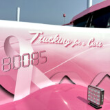 Eva Knelsen says she loves traveling the highways in Ken Worth Jr., a pink and white W900L that honors cancer survivors. (Linda Garner-Bunch/The Trucker)