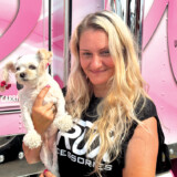 Eva Knelsen, a driver for West Coast Transport, travels North America with Dixie, a Malachi Chihuahua. (Linda Garner-Bunch/The Trucker)