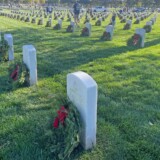 Volunteers placed wreaths on veterans' graves on Saturday, Dec. 16, 2023, at Los Angeles National Cemetery as part of Wreaths Across America. (Bobby Ralston/Trucker News Staff) Wreaths Across America at Los Angeles National Cemetery