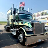 Brenda Osterkamp took home first place in the Working Truck: 2024-2021 Bobtail Conventional category with her black Peterbilt 567. (Linda Garner-Bunch/The Trucker)
