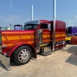 Dan Brubaker took home first place in the Custom Paint: Bobtail category with “Low Life,” a red and gold 1996 Peterbilt 379. The truck also took second place in the Interior: Custom Sleeper category. (Linda Garner-Bunch/The Trucker)