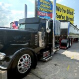 Dane Hartman took home first place in the Custom Paint: Combination, Polish & Detail: Combination, Interior: OEM Sleeper-Combination, Lights at Night: Combination-Theme, Lights at Night: Combination-Most Unique, and Lights at Night: Combination-Overall Presentation categories with “American Dream,” a 2024 Peterbilt 389 and a 2024 Wilson hopper trailer. (Linda Garner-Bunch/The Trucker)