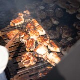 Members of the Iowa 80 Team spent hours each day grilling up pork chops and chicken for attendees to enjoy. (Courtesy: Iowa 80 Group)
