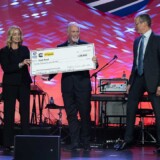 Reed takes the stage during the TCA Driver of the Year awards ceremony during the association’s 2024 convention in Nashville, Tennessee. (Courtesy: Truckload Carriers Association)